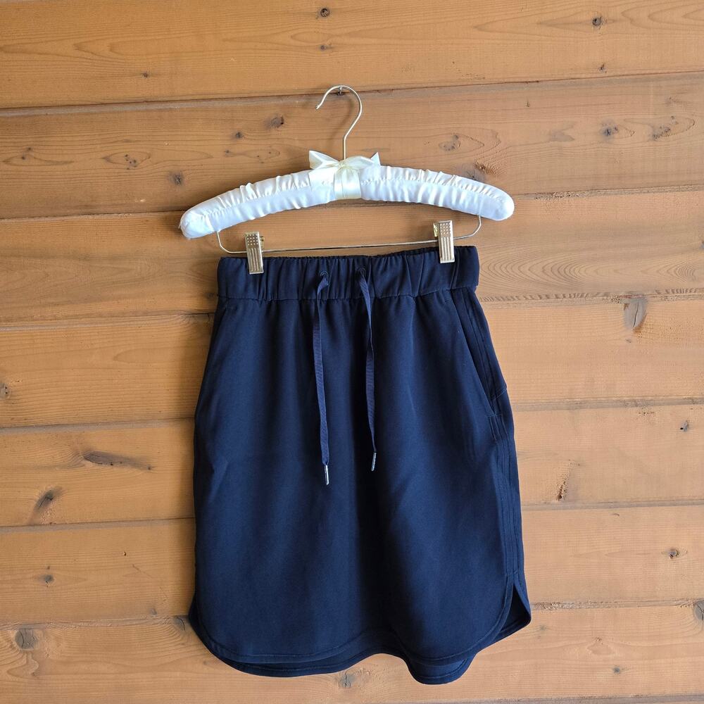 Lululemon Skirt On The Fly Woven Black 4 Tennis Prep Cover Up Stretchy Pockets - Picture 3 of 7